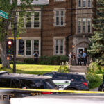 Police at Annunciation Catholic School in Minneapolis on August 27, 2025 following a mass shooting that killed 2 children and injured 17 others, 14 of them children.