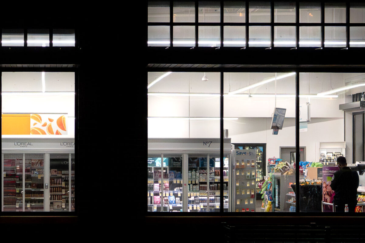 A security guard inside a Walgreens on Hennepin Avenue in Minneapolis.