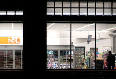 A security guard inside a Walgreens on Hennepin Avenue in Minneapolis.