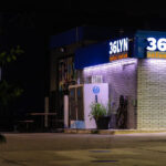 Night photo of 36 Lyn gas station in South Minneapolis.