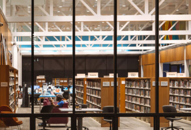A man reading inside the Walker Library on Hennepin Avenue in Uptown Minneapolis.