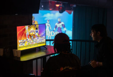 Club goers play video games at Sexy Nerds event in Uptown Minneapolis in September 2025.