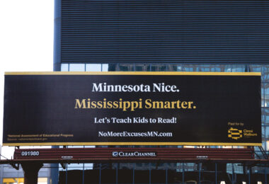 A billboard in Downtown Minneapolis that reads Minnesota Nice Mississippi Smarter. Paid for by Ciresi Walburn.