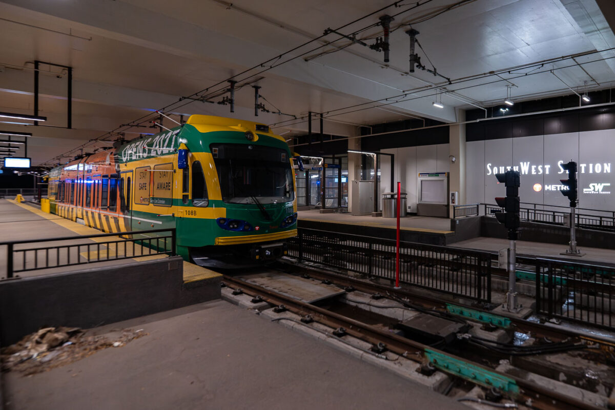 A light rail train, number 108B, is stopped at Southwest Station. This station serves as a transit hub for the region, facilitating commuter travel and connecting various parts of the metropolitan area. The train, part of the Metro Transit system, is designed for efficient urban transportation. Southwest Station's infrastructure includes platforms, tracks, and signaling systems that support the daily operation of the light rail network.