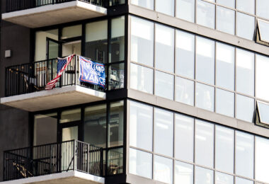 This was the only "counter protester" i saw today at No Kings Minneapolis. Someone hanging an American Flag and a "2024 Trump Vance" flag from their 15-20th floor condo across from US Bank Stadium.

Thousands protest in Downtown Minneapolis on Saturday October 18, 2025 as part of nationwide “No Kings!” protest.