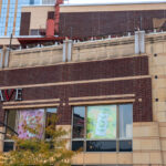 Ads for Gigli THC Drinks in the windows of a downtown Minneapolis office building. Seen on Hennepin Avenue in October 2025.