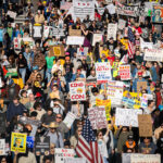 Thousands protest in Downtown Minneapolis on Saturday October 18, 2025 as part of nationwide “No Kings!” protest.