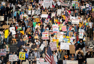 Thousands protest in Downtown Minneapolis on Saturday October 18, 2025 as part of nationwide “No Kings!” protest.