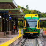 Metro Transit light rail vehicle at the W 21st Street Station in Minneapolis for the very first time.This morning Metro Transit towed a light rail vehicle through the line for the first time doing basic clearance testing. Construction on the green line extension began in 2018 and is set to open to passengers in 2027.