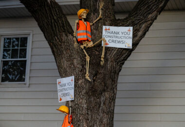 Amid the long-running Hennepin Avenue reconstruction, residents added a dose of humor and gratitude by dressing Halloween skeletons in reflective vests and hard hats, mounting them on a front-yard tree with “Thank You Construction Crews!” signs. This improvised display along the busy corridor captures both the extended disruption of the project and the community’s appreciation for the workers transforming one of Minneapolis’s key thoroughfares.