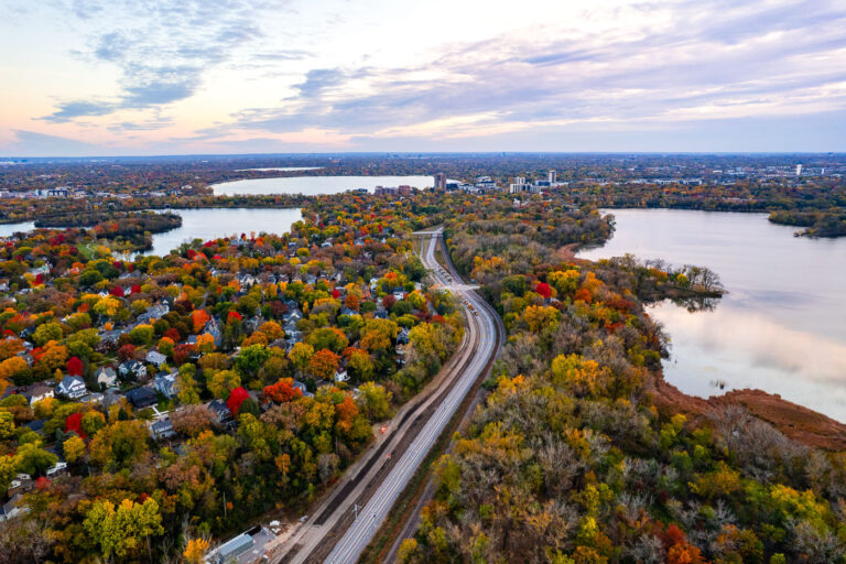 The Lakes around Cedar Lake Trail 4 The new rails of the Metro Transit Southwest LRT green line extension. Lake of the Isles, Bde Maka Ska and Cedar Lake.