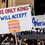 Protest sign that reads "The Only King I Will Accept Is Burger King".Thousands protesst in Downtown Minneapolis on Saturday October 18, 2025 as part of nationwide “No Kings!” protest.