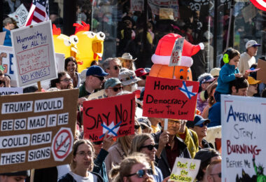 Thousands protest in Downtown Minneapolis on Saturday October 18, 2025 as part of nationwide “No Kings!” protest.