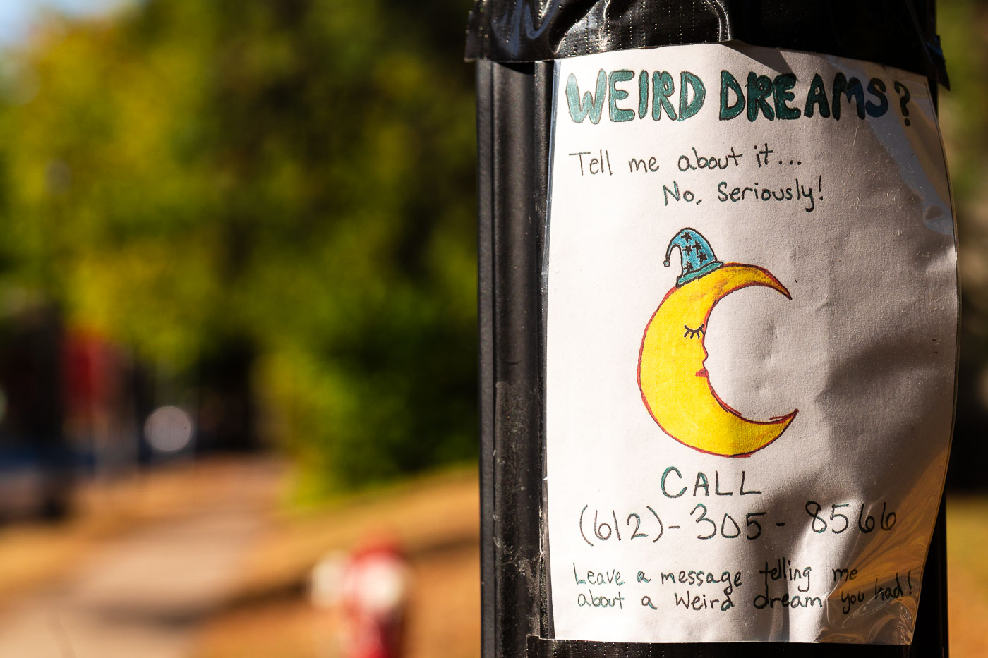 Weird Dreams Flyer on a street pole in Minneapolis