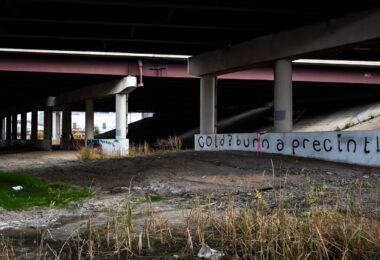 Graffiti reading "cold? burn a precint!"[sic]