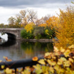 Lake Street bridge over the channel between Lake of the Isles and Bde Maka Ska on a fall day.