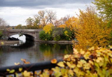 Lake Street bridge over the channel between Lake of the Isles and Bde Maka Ska on a fall day.