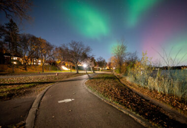 Northern lights visible over a walking path in South Minneapolis. Seen around Bde Maka Ska.