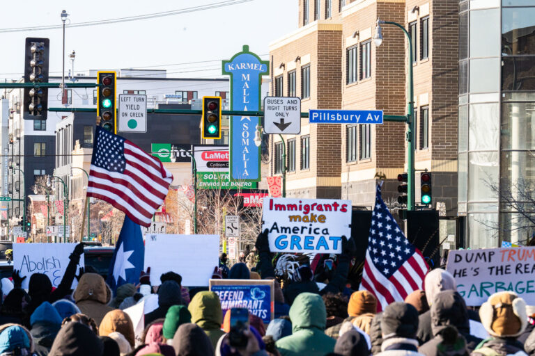 Immigrants Make America Great at Karmel Mall 2 Protesters march to the Karmel Mall, a Somali shopping center in South Minneapolis. Signs reading "Immigrants Make America Great"Thousands marched down Lake Street on a day with windchills struggling to reach 0F.