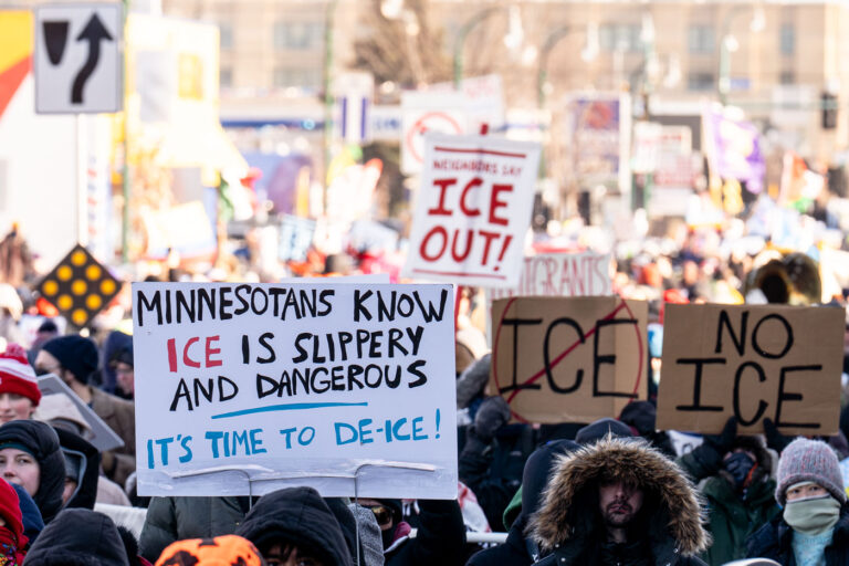 It's Time to De-Ice! 1 Protester at a protest against the actions of ICE in Minneapolis holds up a sign that reads "Minnesotans Know Ice Is Slippery And Dangerous Its Time To De-Ice!"The protest took place on a day with near below 0F windchills.
