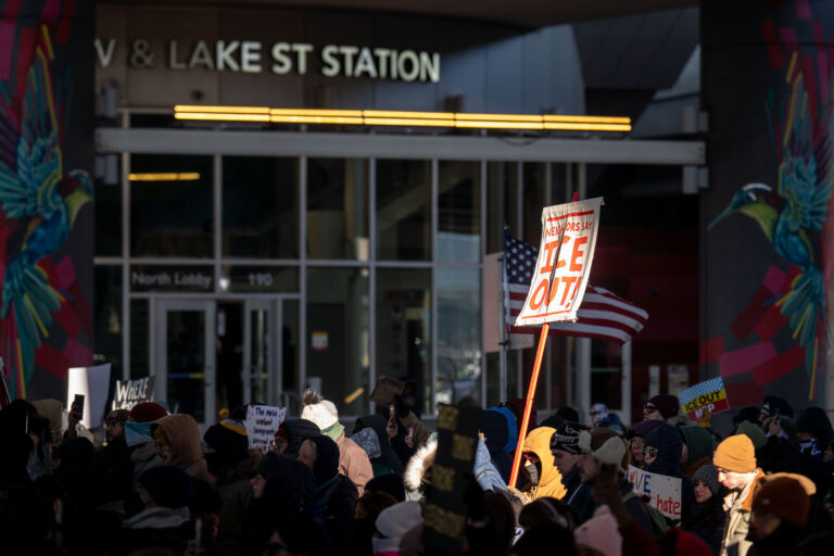 Neighbors Say ICE OUT! 4 Protesters march down Lake Street past the Lake St Station.The protest took place on a day with near below 0F windchills.