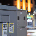 Protect Our Somali Neighbors in Minneapolis 3 Posters on electrical boxes in Uptown Minneapolis that reads "Protect our Somali Neighbors".