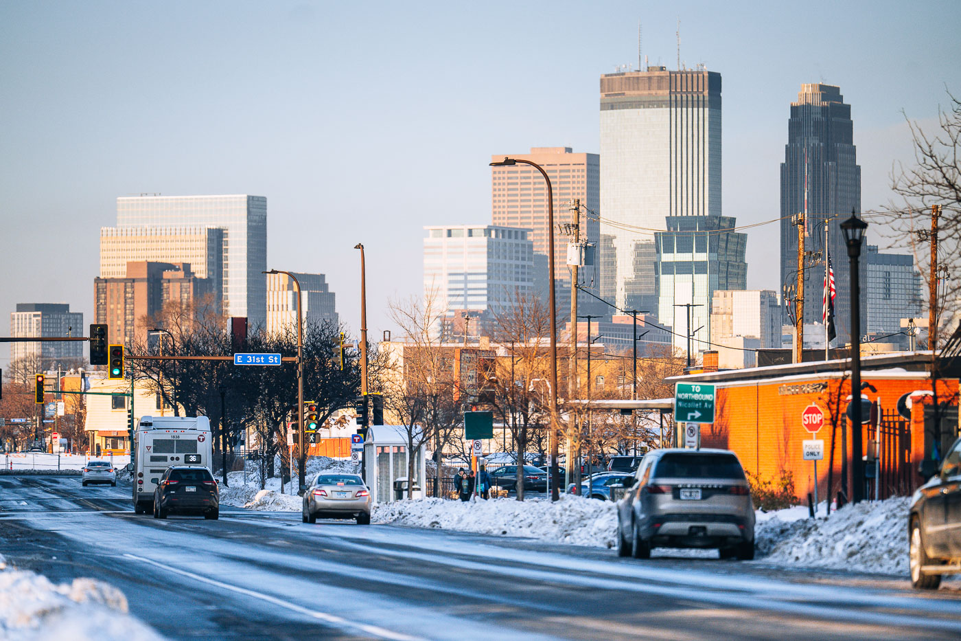 Snow covered Nicollet Ave and Minneapolis skyline