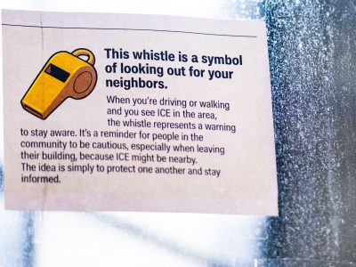 Karmel Mall Notice: Whistle Symbolizes ICE Warning on Lake Street