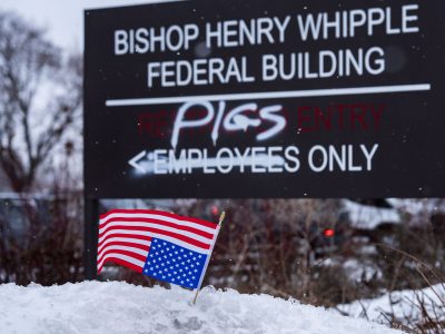 "Pigs" Graffiti Defaces Whipple Federal Building Sign, Minneapolis