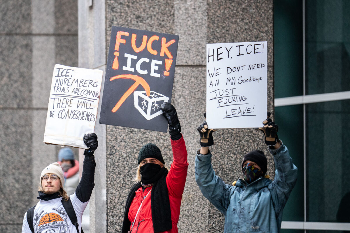 Protesters at a Jake Lang counter protest in Downtown Minneapolis on January 17, 2026. Signs read:ICE:NUREMBERG TRIALS ARE COMINGTHERE WILL BE CONSEQUENCESFUCK ICE!HEY, ICE!WE DON’T NEED AN MN GOODBYEJUST FUCKING LEAVE!