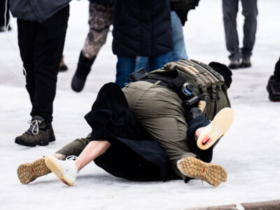 Border Patrol arrests protester outside Whipple Building, Minneapolis