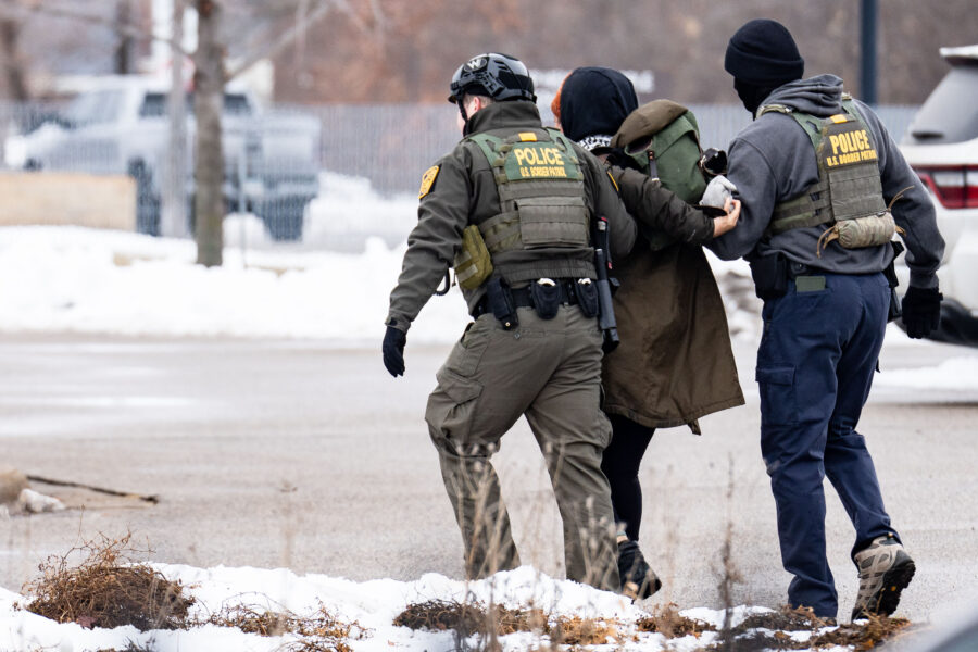 Border Patrol arrests protester at Minneapolis Whipple Building