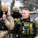 BORTAC and Greg Bovino 3 Border Patrol Commander Greg Bovino walks alongside BORTAC officers at a Speedway gas station in Minneapolis on January 22, 2026.
