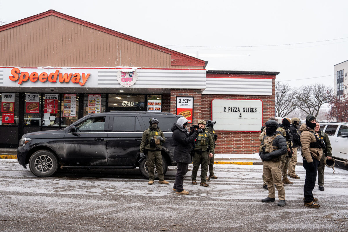 Border Patrol agents do a photo shoot at a Speedway gas station with Commander Greg Bovino on January 21, 2026 in Minneapolis.