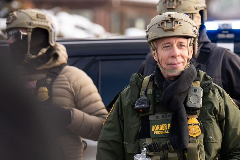 Border Patrol Chief Greg Bovino in Minneapolis 1 Border Patrol Chief Greg Bovino is pictured in Minneapolis. The image was taken near Portland Avenue and 34th Street, the location where city officials confirmed an ICE agent shot an observer. According to local news reports, a witness stated the ICE agent fired multiple shots into the face of a person who was attempting to turn their car around. This incident occurred during a period of heightened federal immigration enforcement activity in the city.