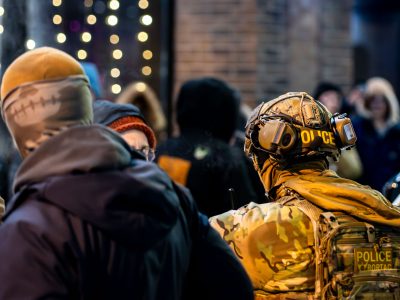 BORTAC Officer Amid Crowd on Lake Street, Uptown Minneapolis