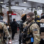 BORTAC officers at Minneapolis gas station 3 Border Patrol officers part of the tactical BORTAC unit outside a gas station in South Minneapolis on January 21, 2026.