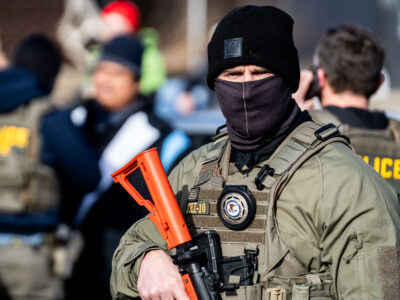 Bureau of Prisons officer with Less Lethal Weapon at Park Ave, Minneapolis