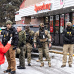 Federal agents at Speedway in Minneapolis January 21 2026 4 Federal agents outside a Speedway gas station in South Minneapolis as an observer blows a whistle. Seen on January 21, 2026.