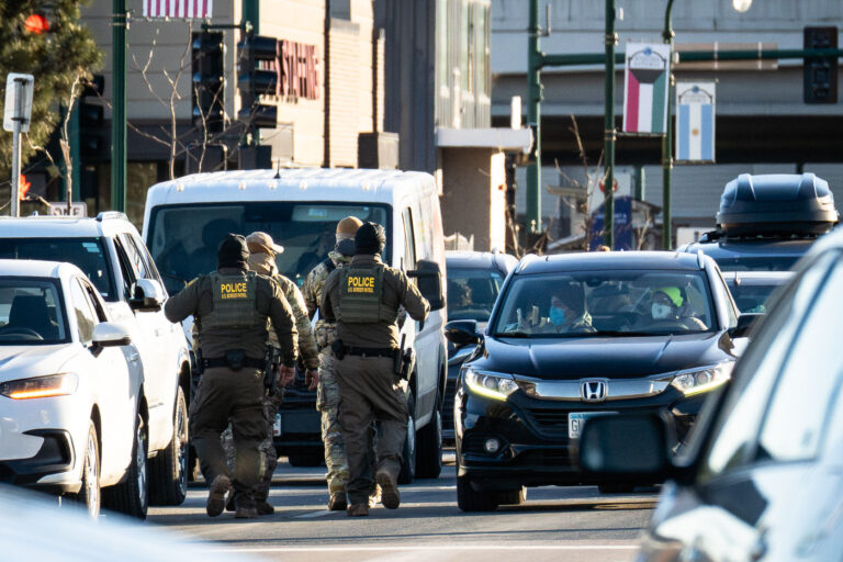 Border Patrol and Bystanders, Minneapolis 2 Border Patrol officers take someone into custody on Lake Street in Minneapolis on January 14, 2026.