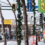 Frigid Cold Ice Out of Minneapolis 4 2 people walk down Lake Street in Minneapolis on the morning of January 19, 2026 while holding signs that read "I.C.E. OUT OF MINNEAPOLIS". The sign is in the style of the Minneapolis Snow Emergency route signage.Current temperature: -1°FFeels Like: -18°F
