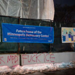 FUCK MPD FUCK ICE at 3rd Precinct Police Station 1 Graffiti on the barricades around the former Minneapolis police 3rd precinct police station. The police station was burned in May 2020 following the murder of George Floyd.
