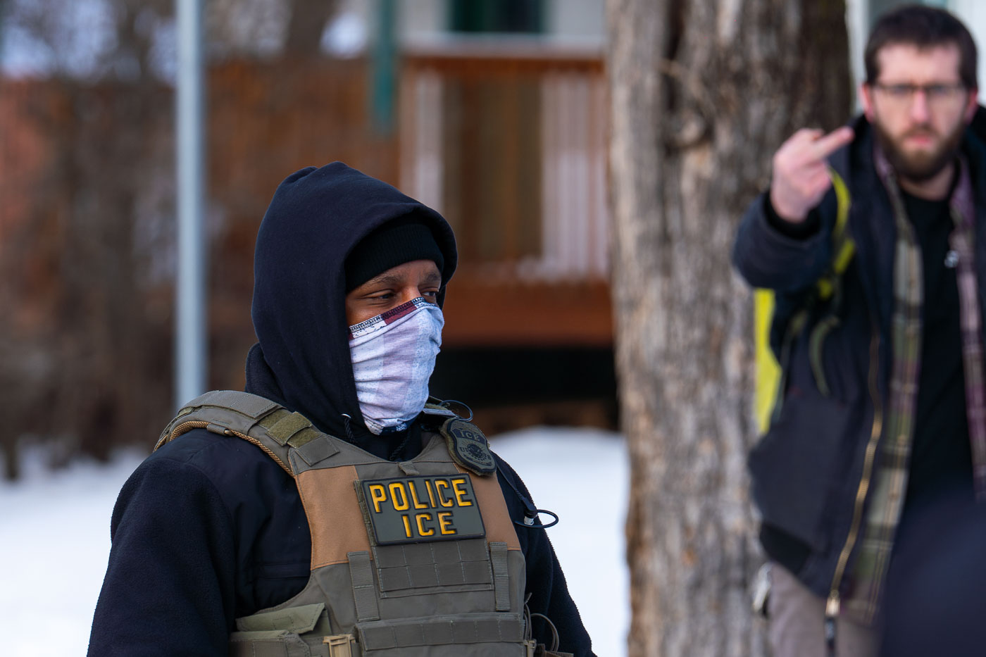 ICE Agent and Protester at Renee Good Scene