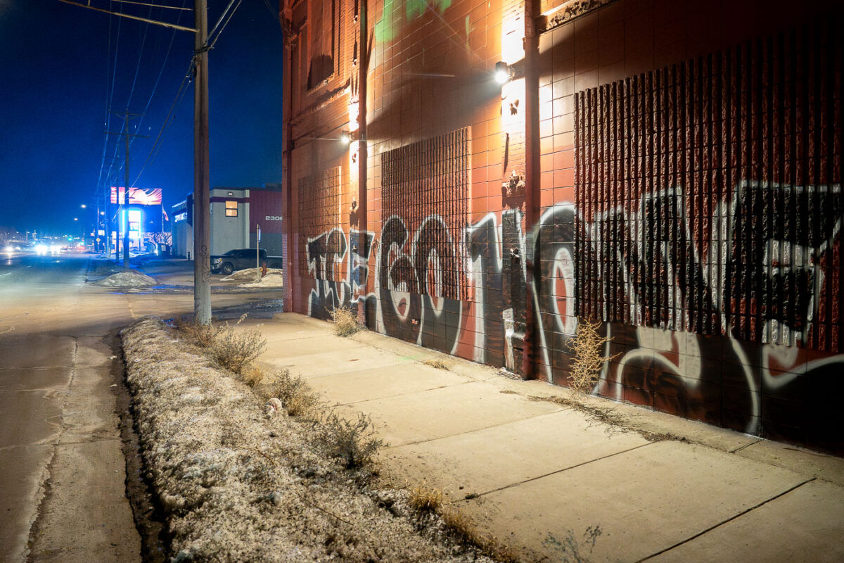ICE GO HOME graffiti with heavy tear gas in the air.