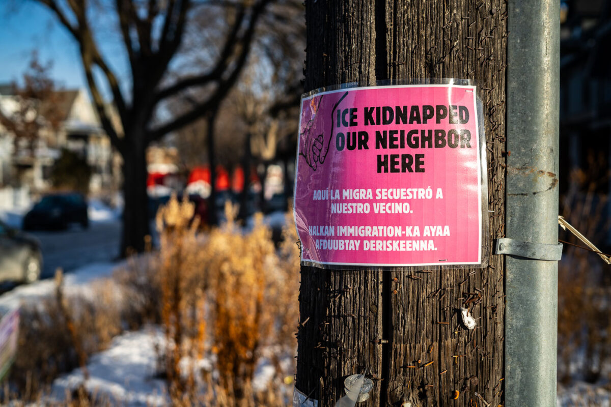 A laminated flyer stapled to a utility pole in South Minneapolis that reads "ICE Kidnapped Our Neighbor Here". Seen on January 26, 2026.