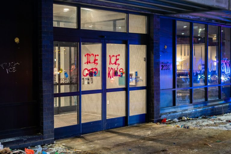 Minneapolis Home2 Suites Graffiti: ICE KILLS 3 Graffiti reading "ICE KILLS" and "FUCK ICE" is spray-painted on the entrance of the Home2 Suites Hilton in Minneapolis.