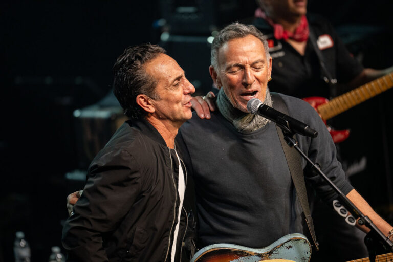 Ike Reilly and Bruce Springsteen at First Avenue, Minneapolis 1 Musicians Ike Reilly and Bruce Springsteen perform at First Avenue in Minneapolis. The "Concert of solidarity & resistance to defend MN!" was held to protest the actions of Immigration and Customs Enforcement (ICE). The event, announced on Wednesday, featured Springsteen as a special guest alongside artists including Tom Morello, Rise Against, Al Di Meola, and Ike Reilly. First Avenue is a historic music venue in downtown Minneapolis, known for hosting a wide range of musical acts since its opening in 1970.