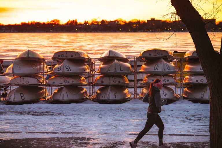 Jogger during susnet at Bde Maka Ska, Minneapolis 2 they can't take the sunsets