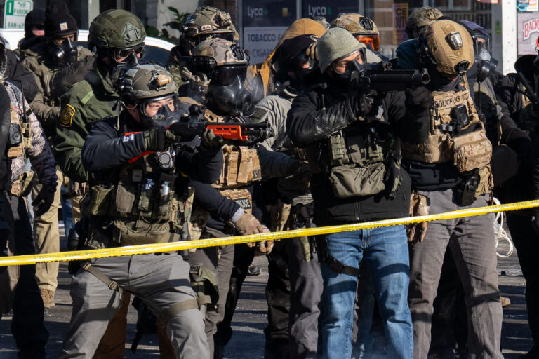Officers with less lethal launchers, Minneapolis 4 ICE and Border Patrol agents on Nicollet Avenue on January 24, 2026. This follows the shooting death of Minneapolis resident Alex Pretti. Pretti is the second person killed and third person shot by federal agents in Minneapolis this month.