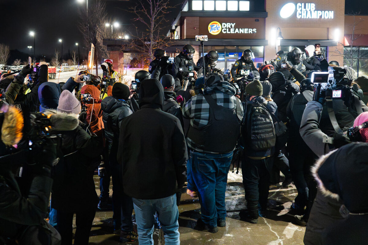 Streamers with their bullet proof vests and self sticks flock to a suburban town for content. Shown here filming 1 person being arrested for not dispersing at a noise demonstration.Maple Grove, Minnesota January 26, 2026